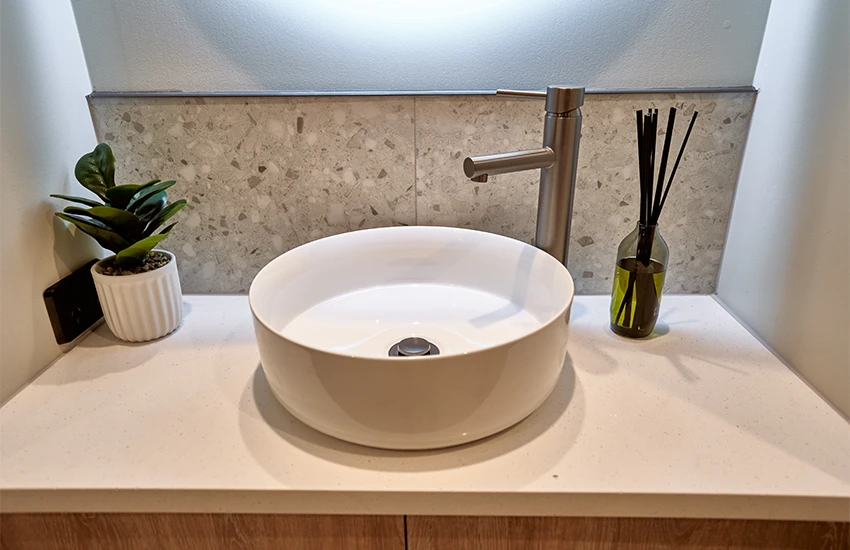 White porcelain bathroom basin and vanity unit in recent bathroom installation.