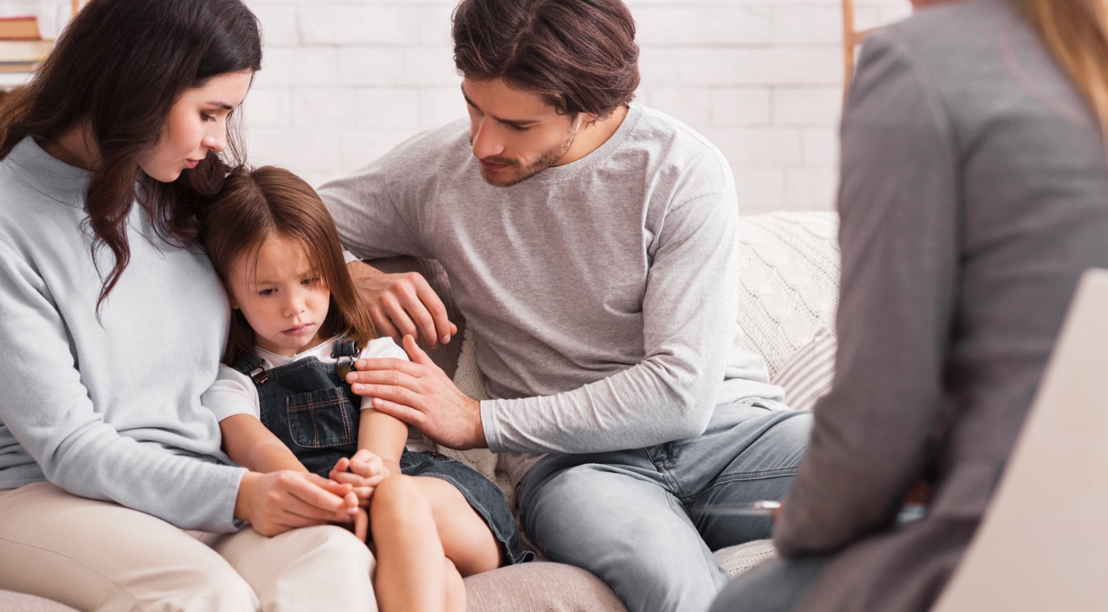 A warm family moment during an in-home session