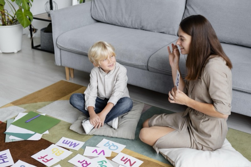A child engaged in a hands-on learning activity at home