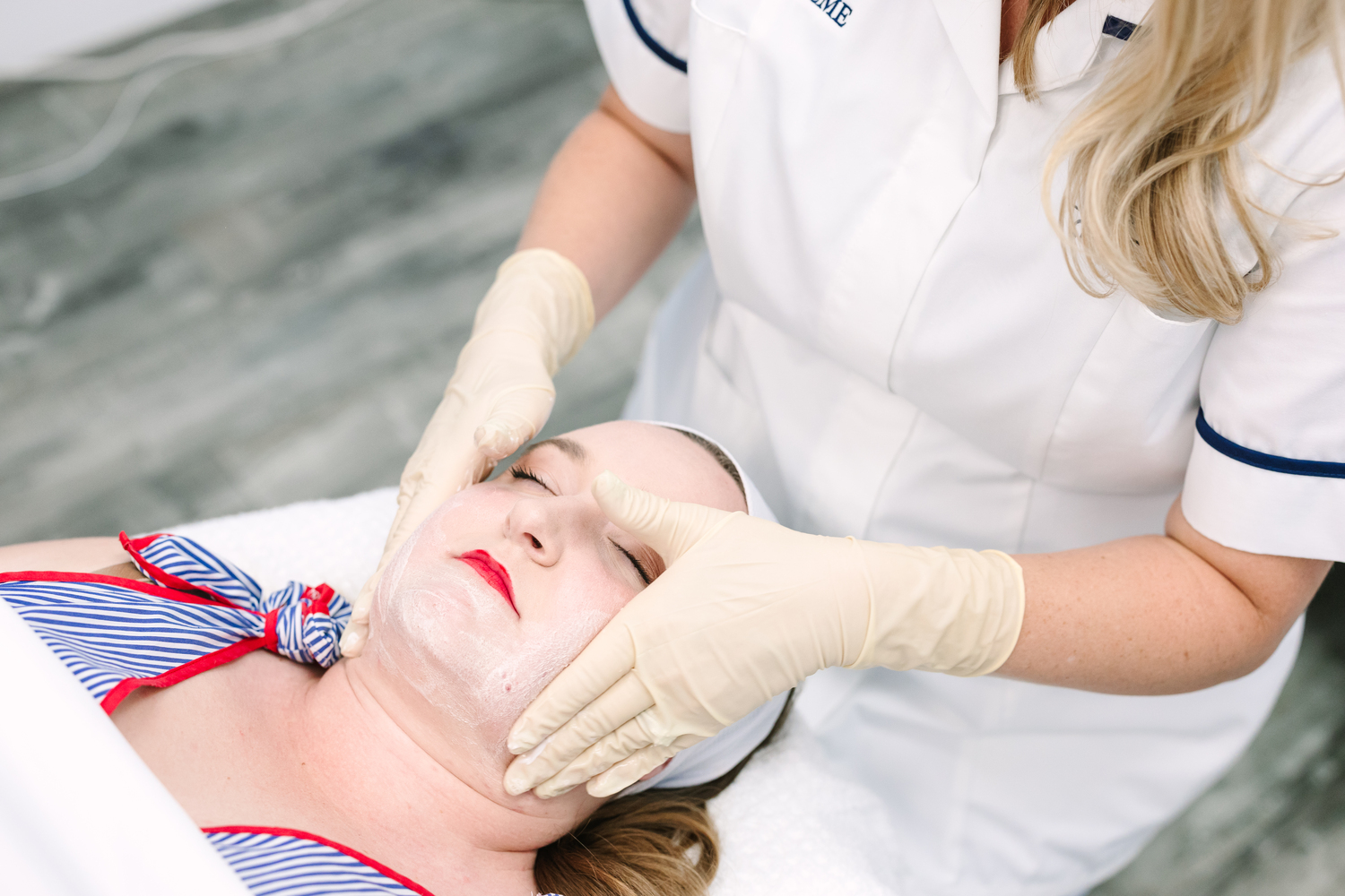 Client receiving a professional aesthetic facial treatment in Torrance, California for clearer and smoother skin
