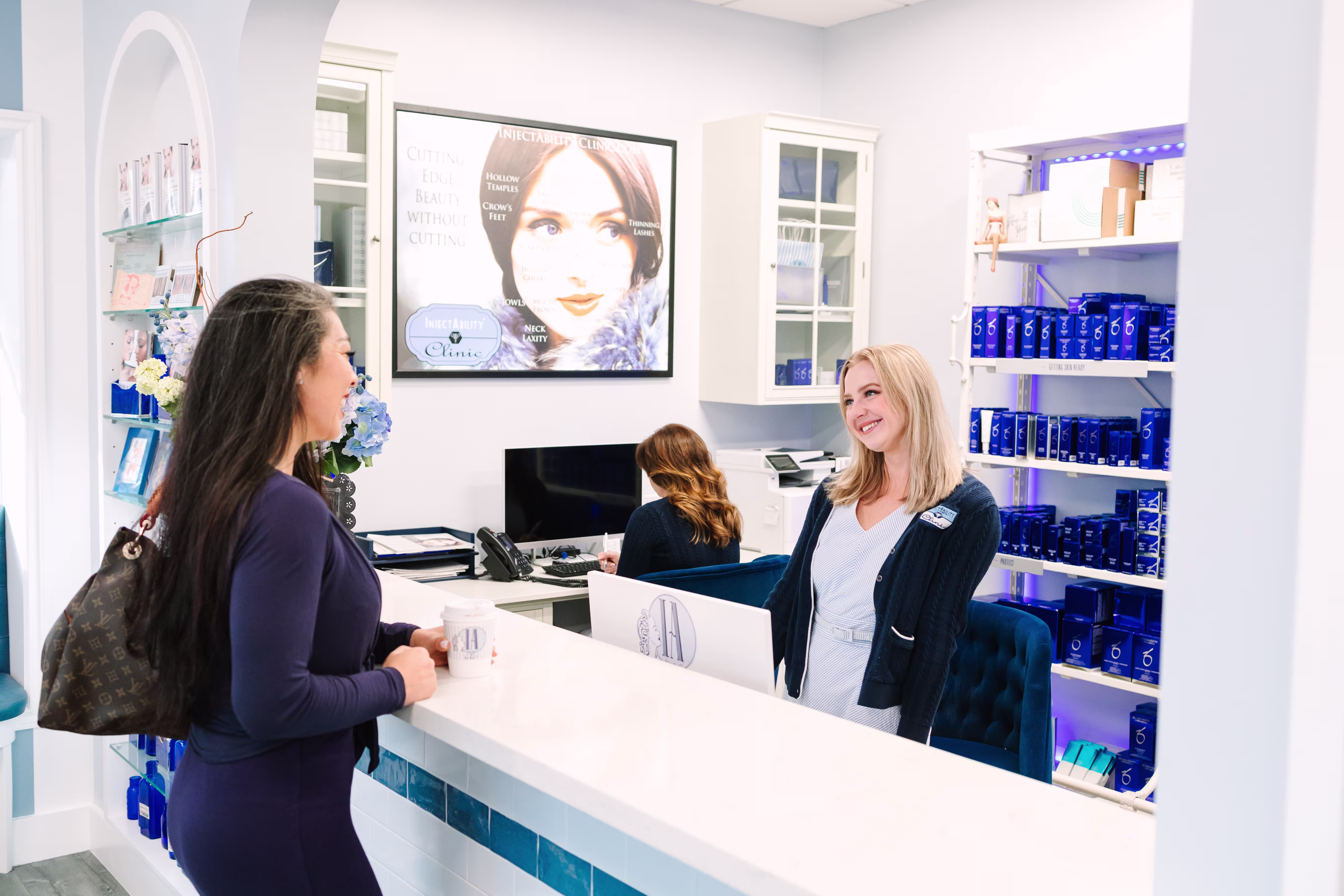 Esthetician reviewing a personalized skin care routine with a client at a medical spa in Torrance, California