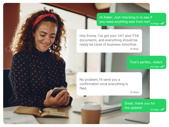 Image of female business owner texting