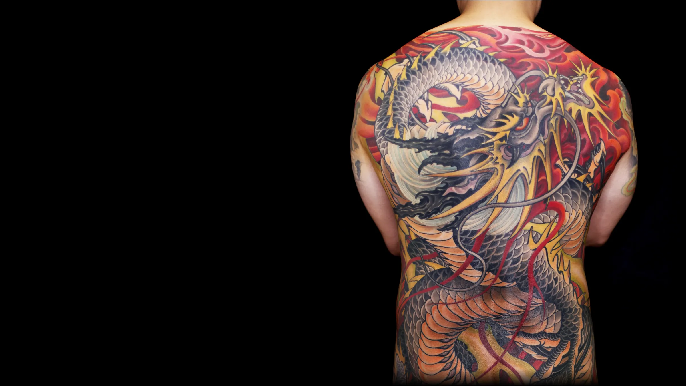 Japanese dragon back piece tattoo by Yushi at Oyabun Tattoo, San Diego