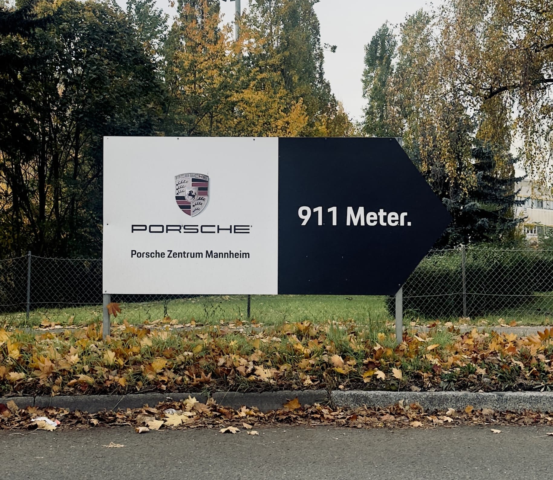 Porsche 911 meter sign - example of consistent brand identity