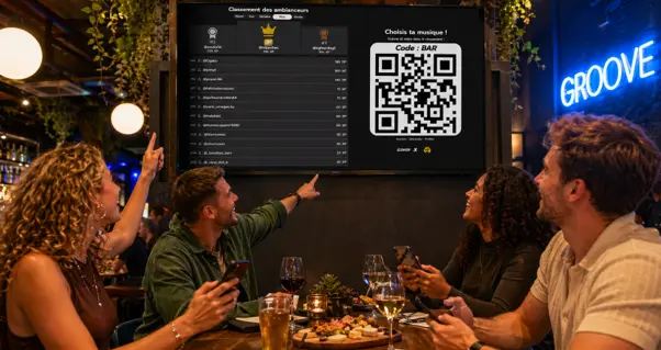 Clients dans un bar pointant le classement gamifié du jukebox connecté ZIKER affiché sur écran TV
