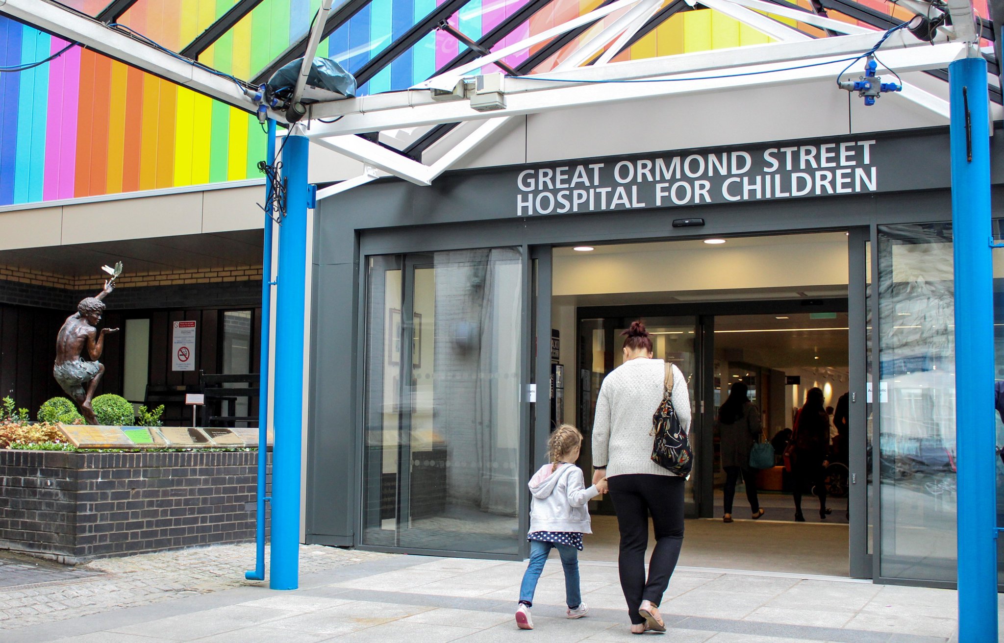 Great Ormond Street Hospital for Children entrance, London, with painted blue columns