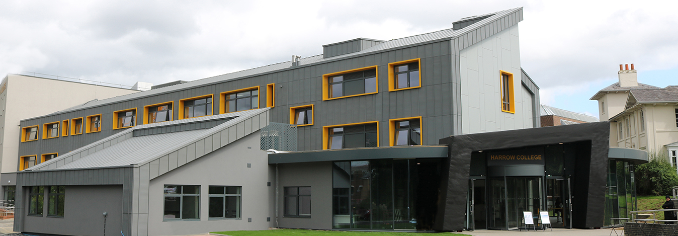 Harrow College modern grey facade with yellow window surrounds, London