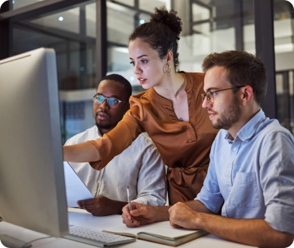 sapro employees working at desk