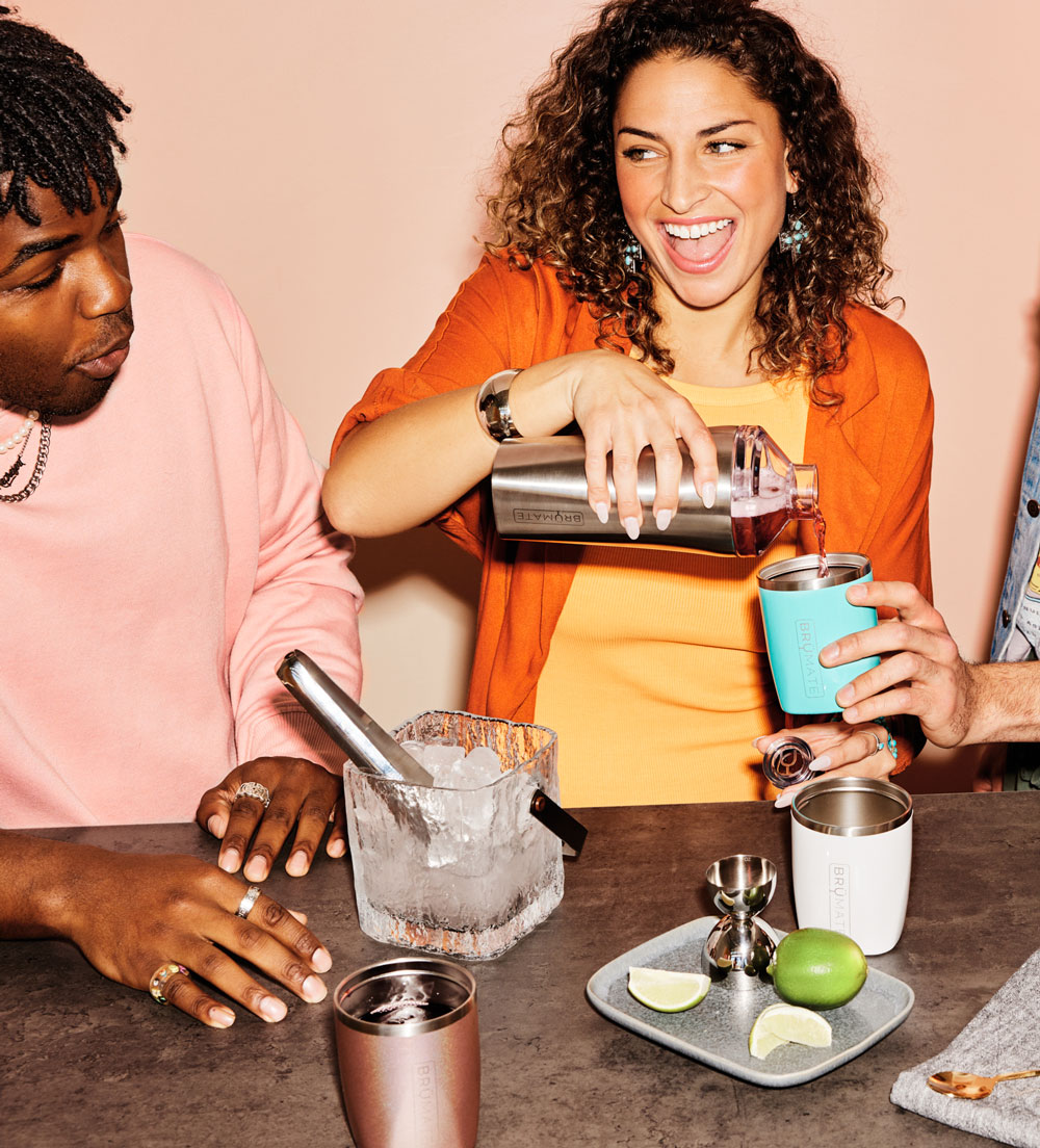 Friends pouring drinks