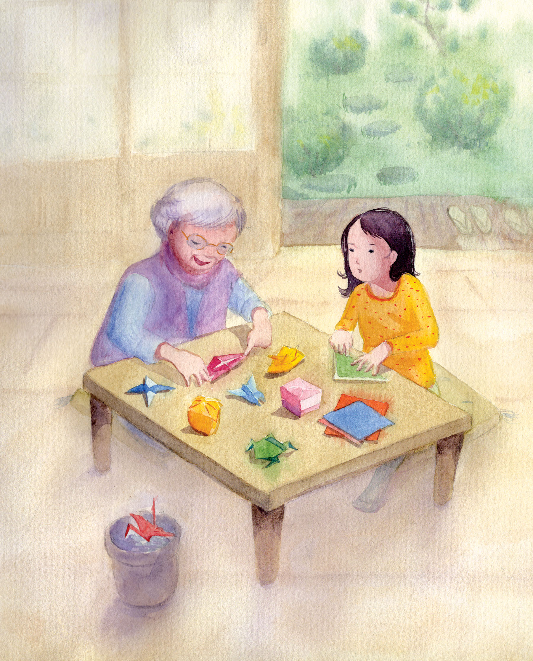 Watercolor painting of a young girl with her Japanese grandmother sitting at a low table folding colorful origami papers together in a traditional Japanese house with a garden.