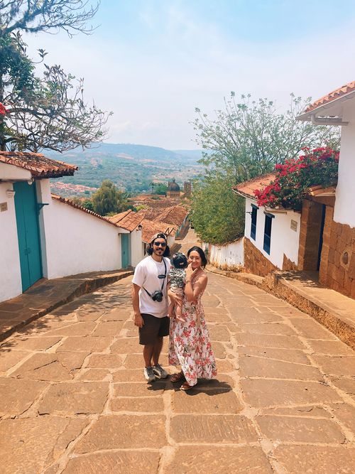 A photo of Alejandra, André and their son