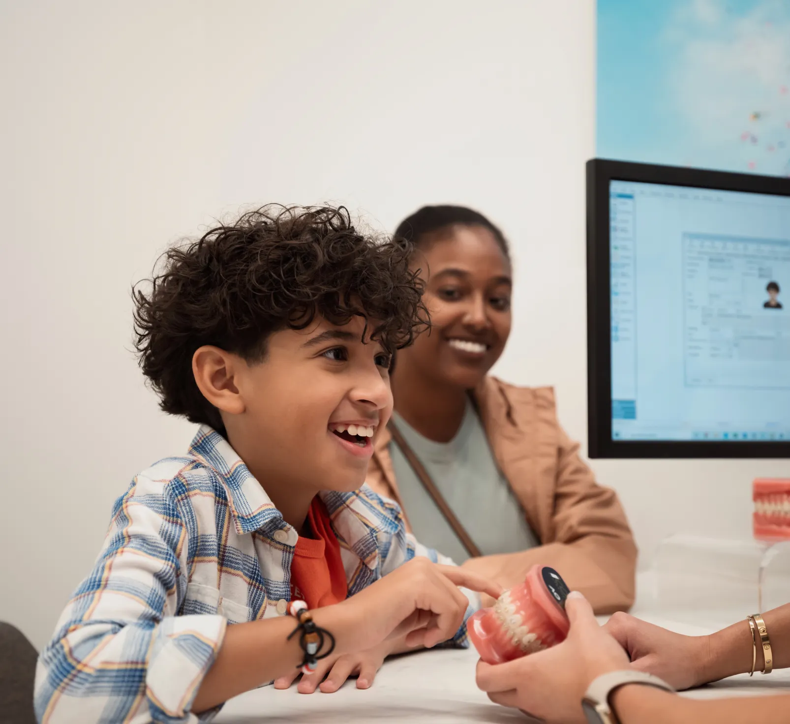 Pediatric patient talking to Dr. Fleming.