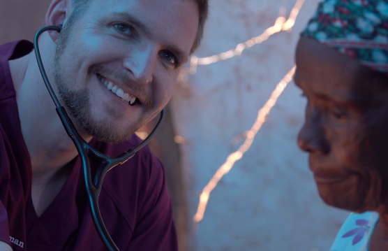 Volunteer Person Helping People With Smile