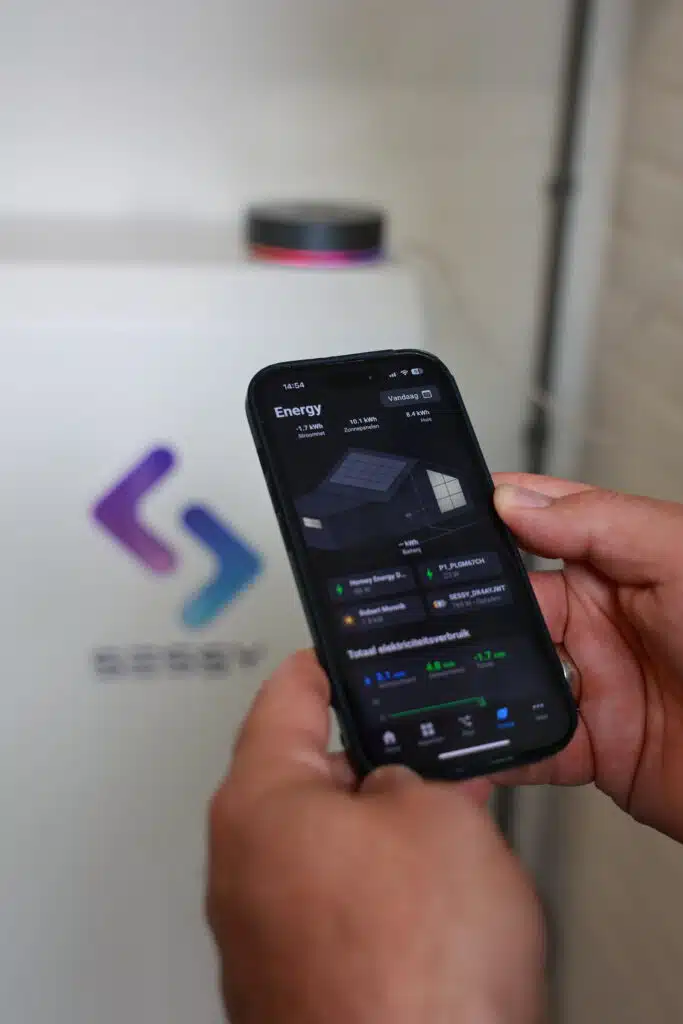 Smartphone toont de Sessy app.