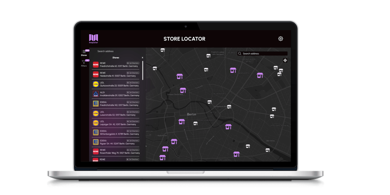 A laptop screen displaying a map of Berlin.