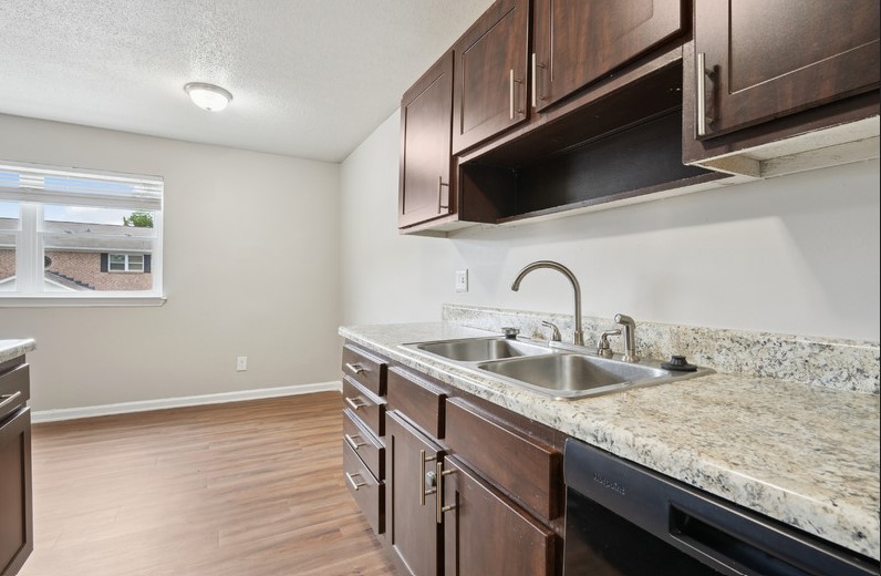 Kitchen with brown cabinets