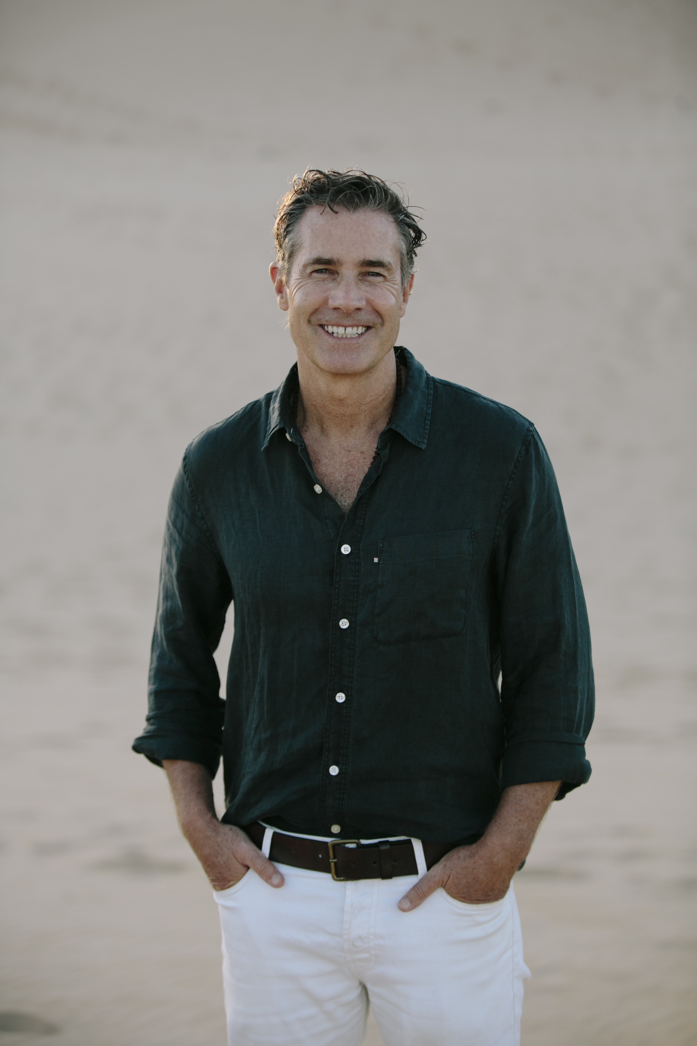 a man poses for a portrait