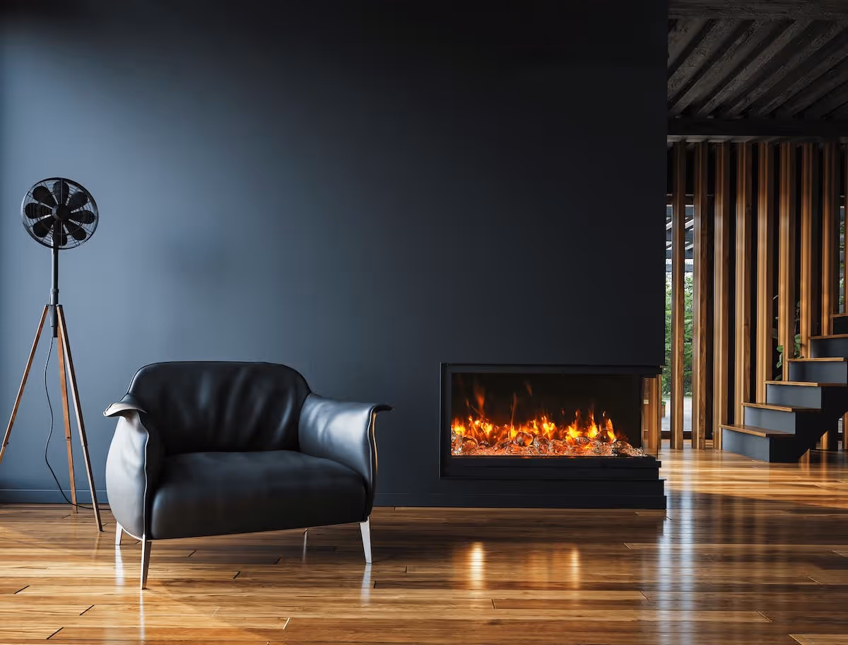 minimal living space featuring a modern inset fireplace