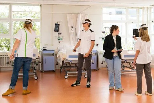 Nurse learners wearing VR headsets