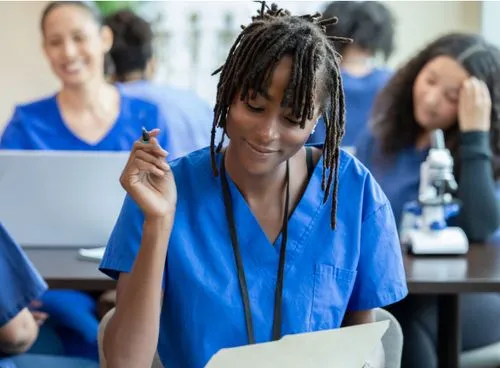 Female nurse learner taking a test