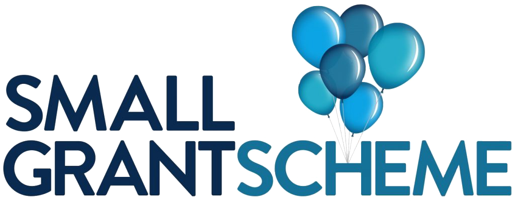 Small Grant Scheme logo with text in blue shades and a cluster of five blue balloons above the letters SCHE in Scheme.