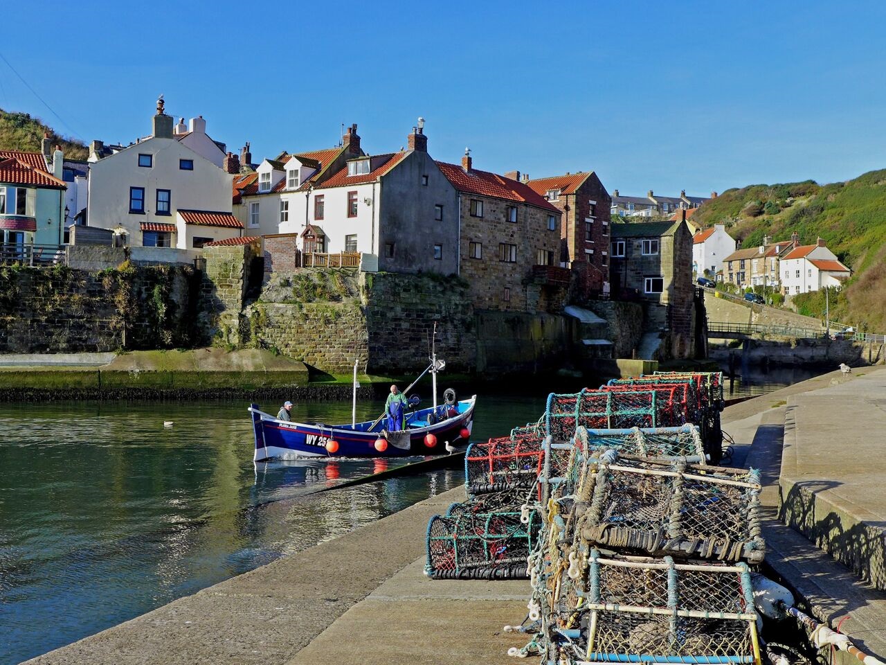 The village of Staithes wth tradtional Whitby Coble