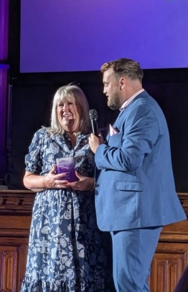 Karen Receiving Her Award At the 2025 BBC Radio Manchester Make A Difference Awards