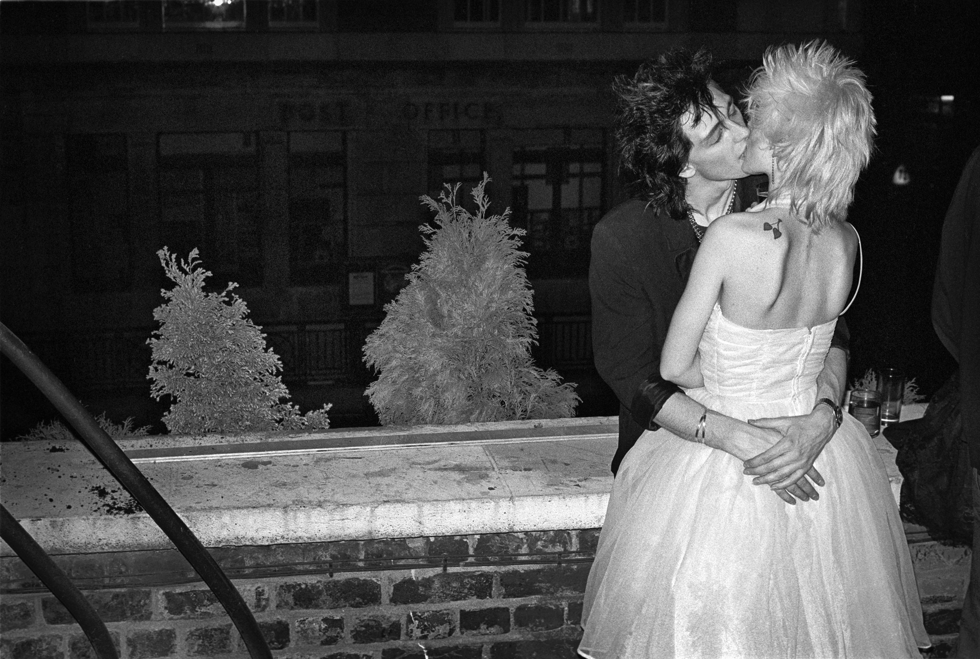 Kissing at Camden Palace in 1982. By subculture photographer Derek Ridgers