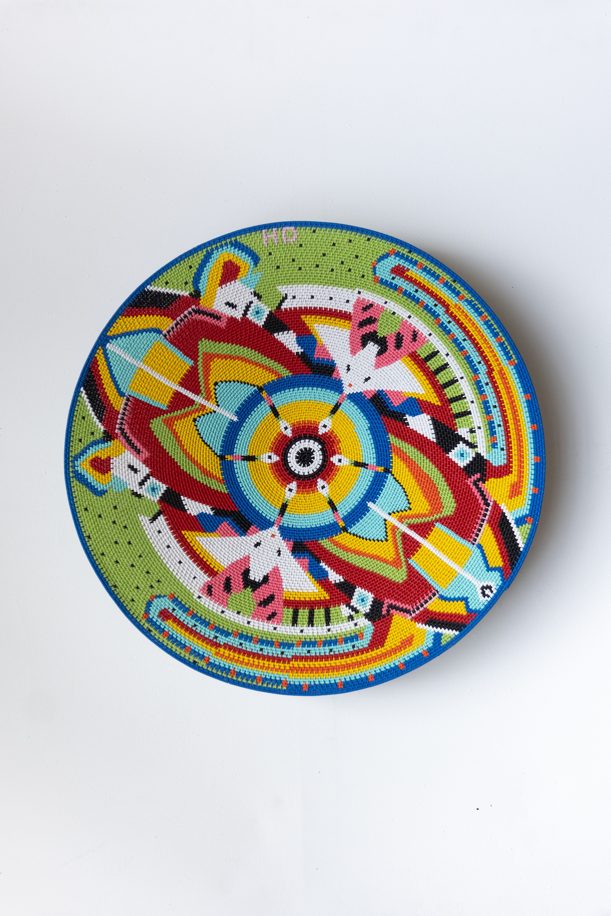 Woven with multicoloured geometric pattern, 50cm diameter, 2025