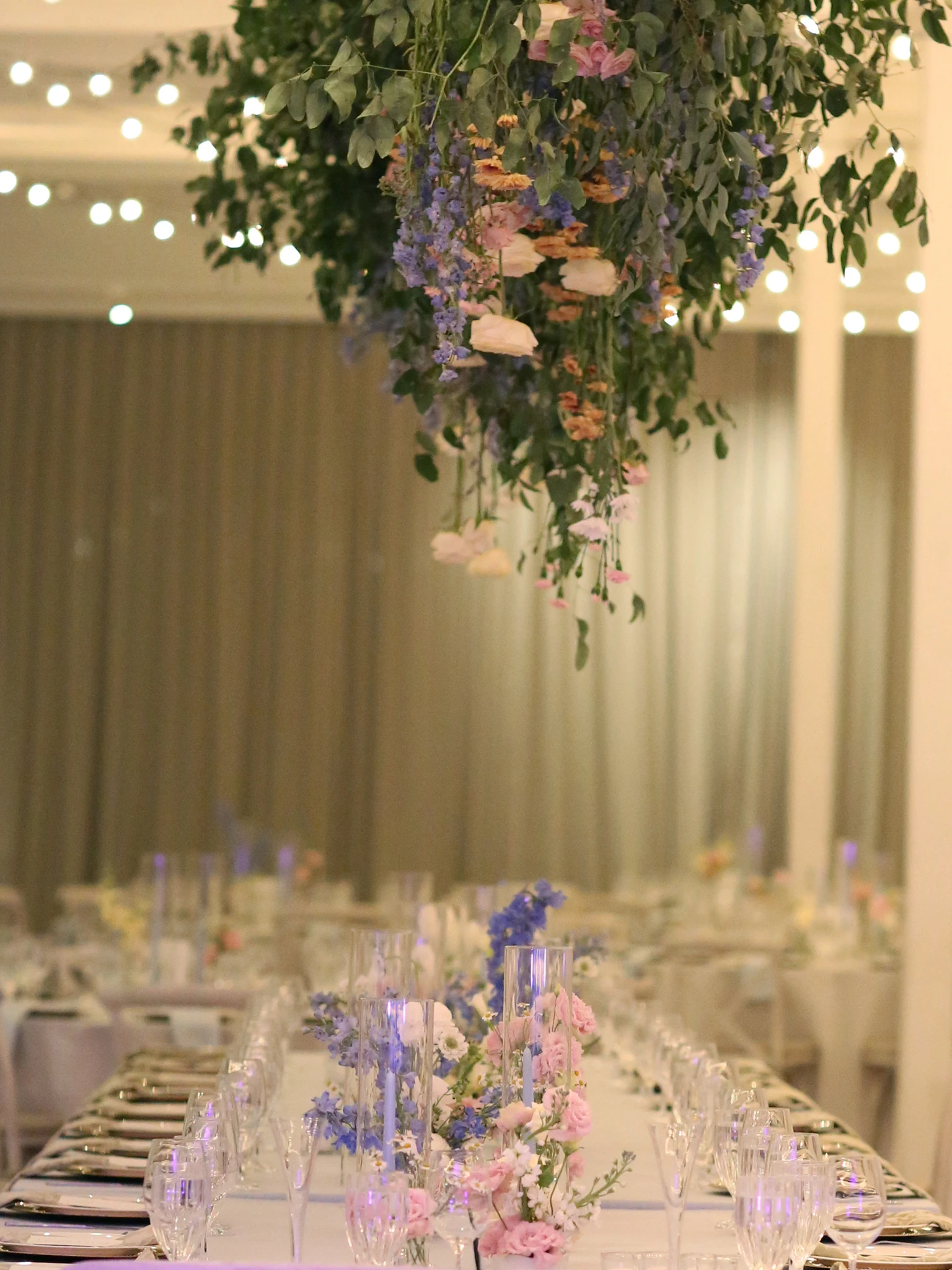 flowers fover a banquet table