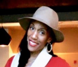 Ms. Cleo Dancy, staff member with hat
