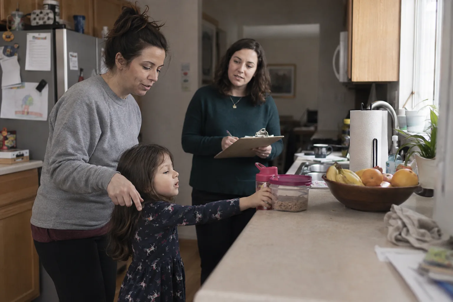Parents practicing positive behavior support strategies at home in Sandy Springs, GA