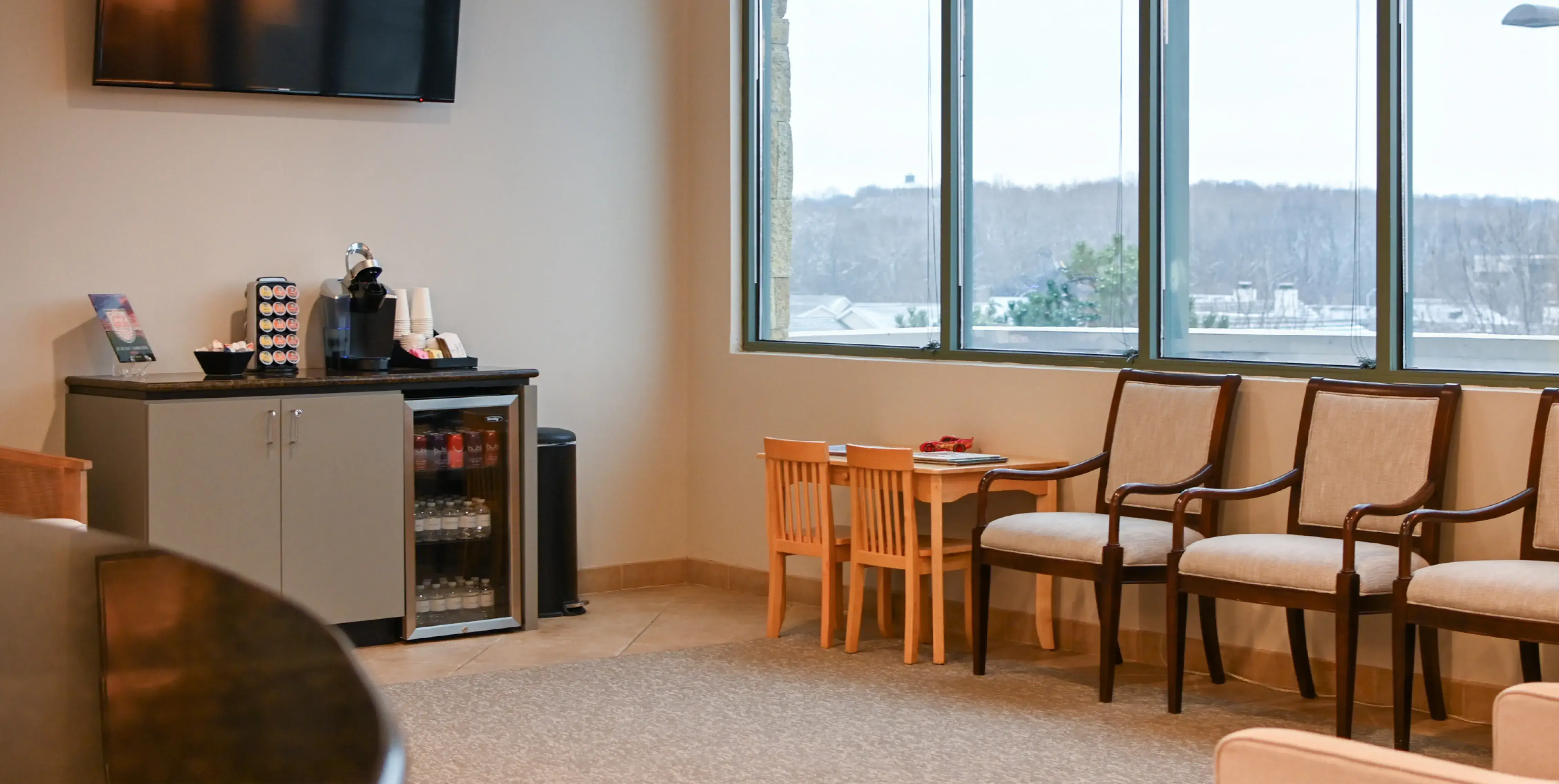 A row of chairs in a waiting room.