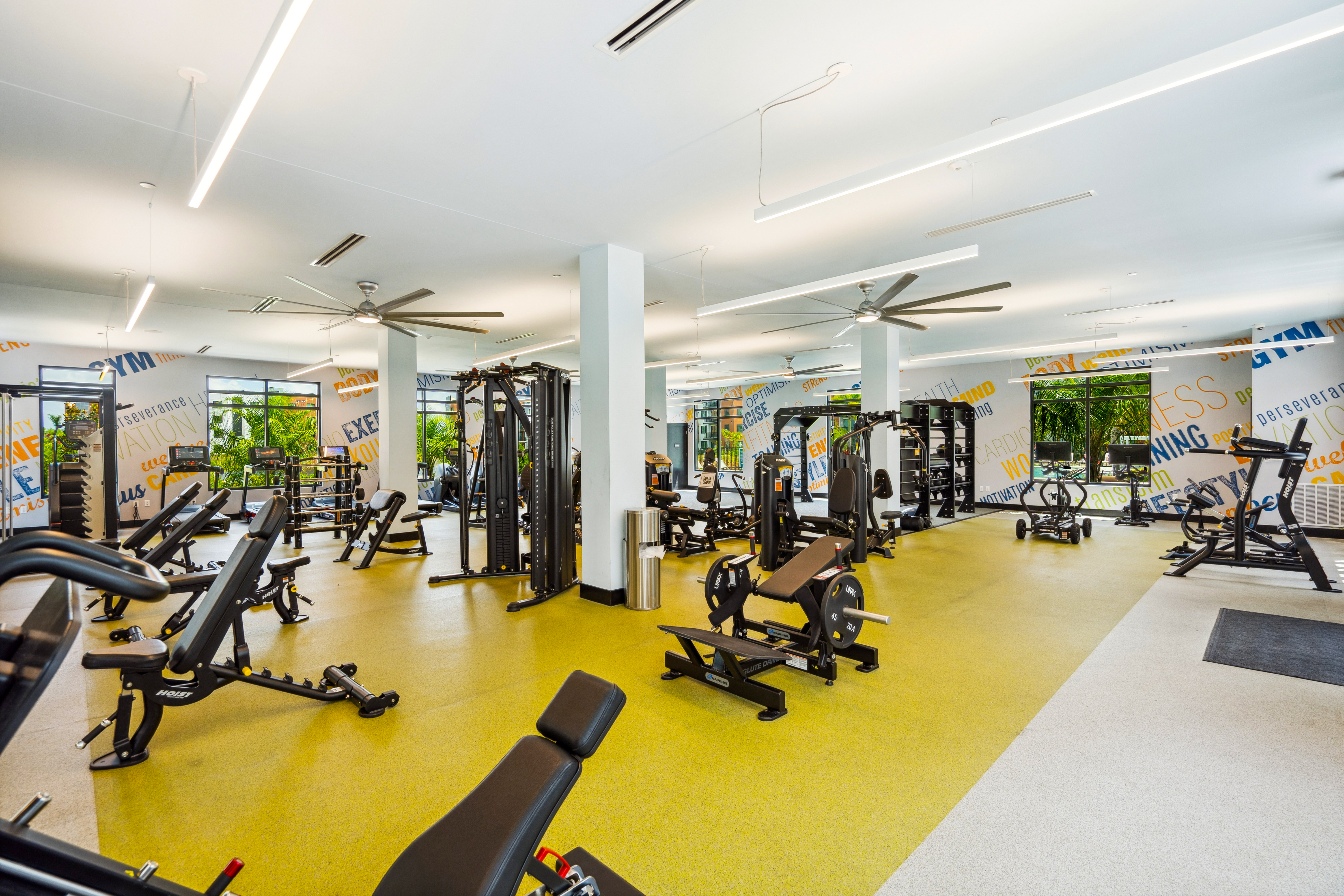 24/7 Fitness Center with Spin Room, Yoga Studio, and TRX system