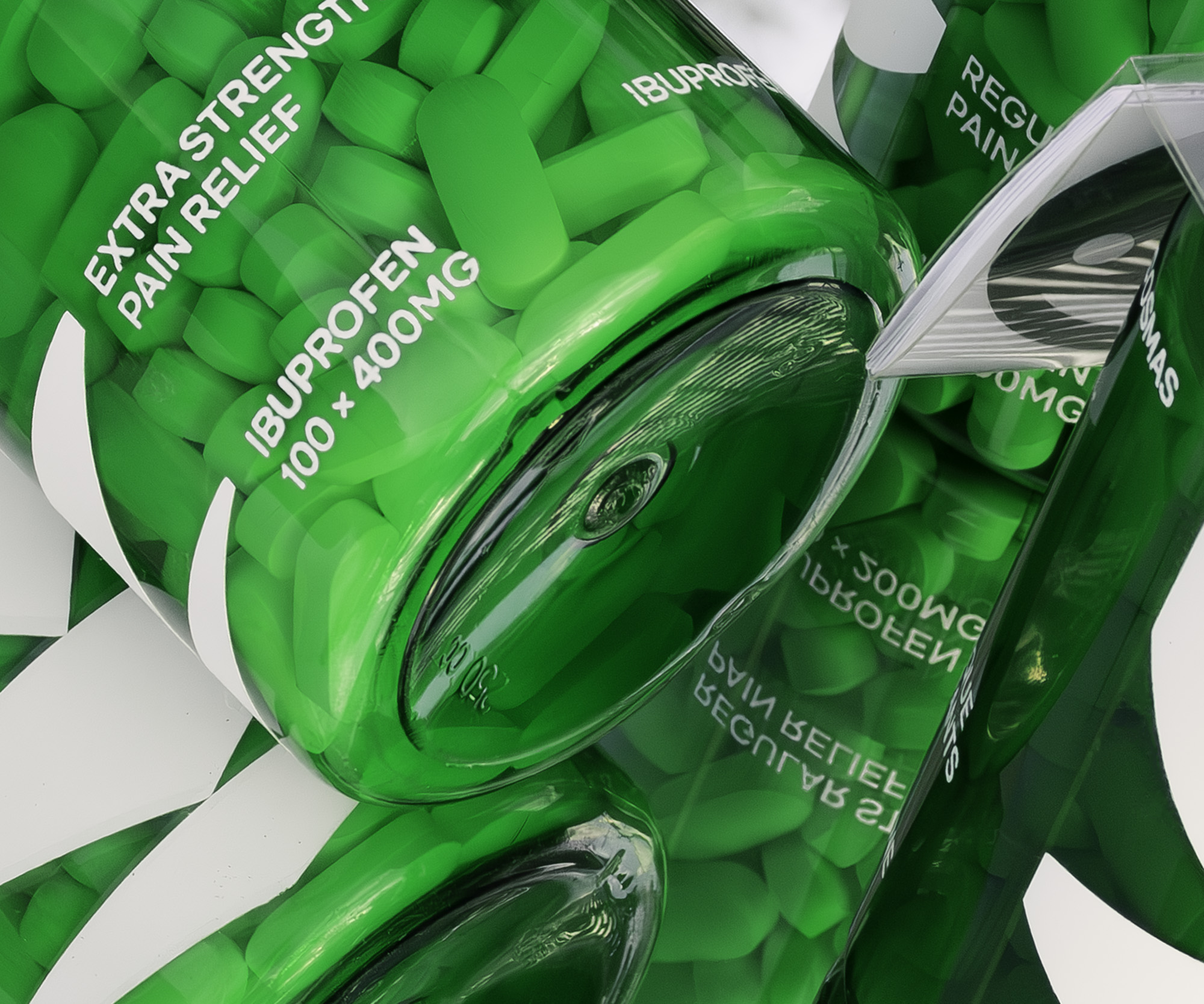 Closeup of the three pill bottles on a mirrored background. 