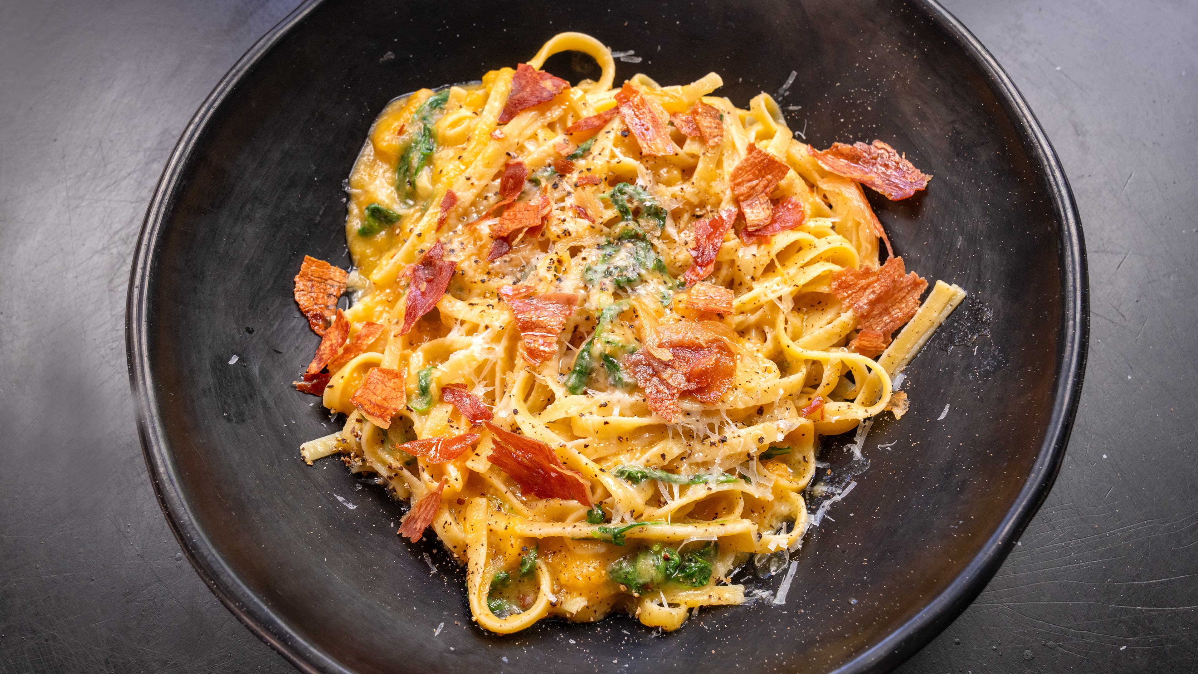 Melon Pasta with Crispy Prosciutto & Arugula