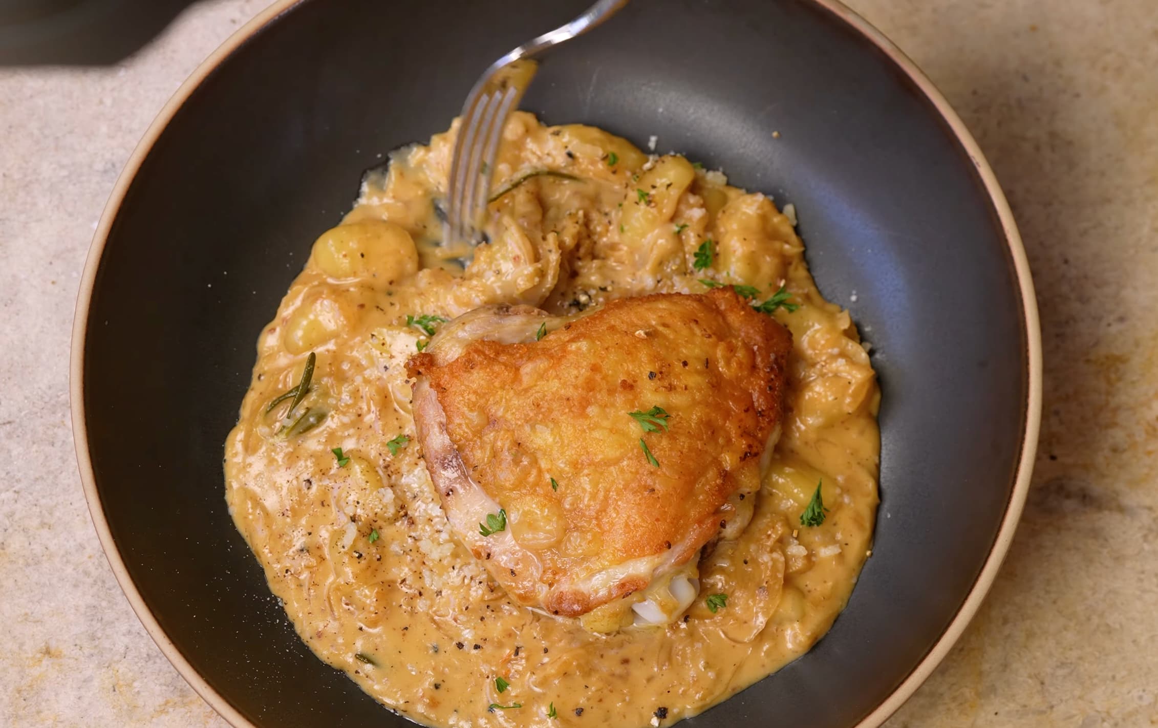 Crispy Chicken Thighs with French Onion Gnocchi
