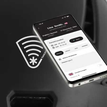 A Twiceme helmet logo being scanned by a smartphone with medical information presented
