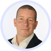 A man wearing a white shirt and a blue jacket.- Salespeak Images