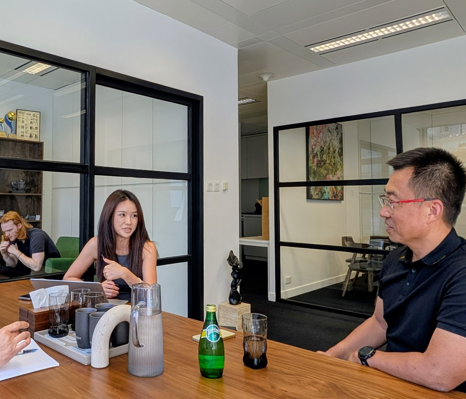EVIDENT team in conversation with a partner