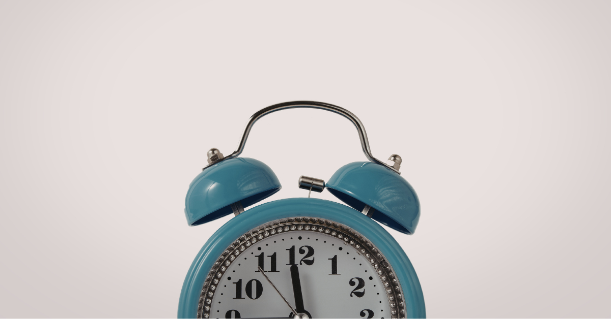 Close-up of a clock and overdue invoice showing the need for an Alberta collection ag service.