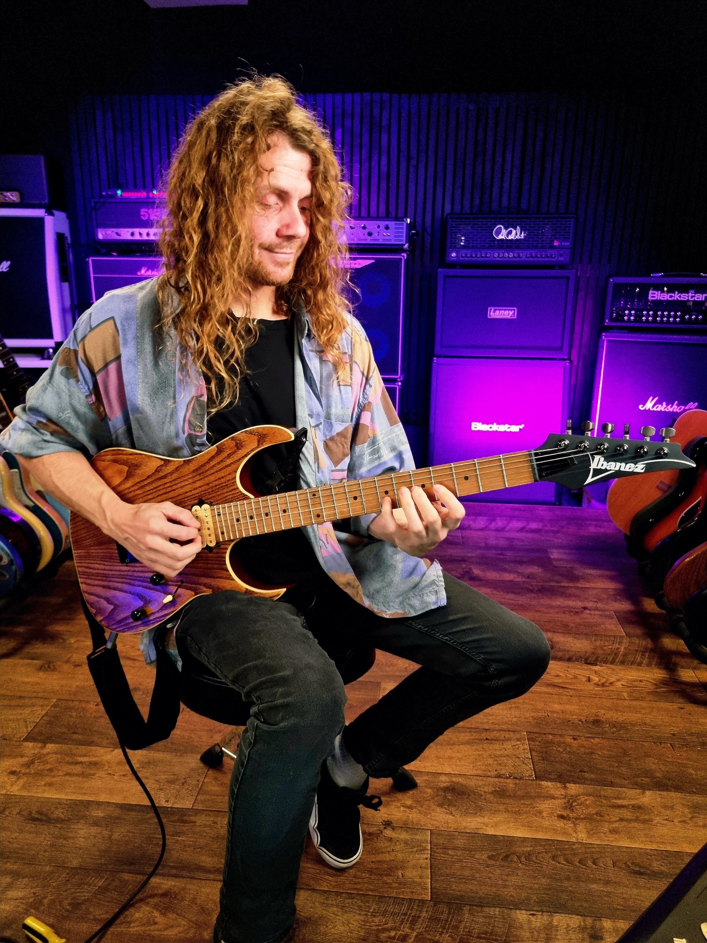 Sam Bell at LickLibrary in 2026 holding an Ibanez Guitar