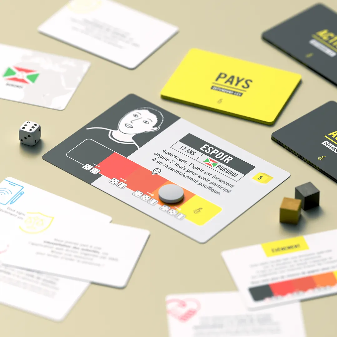 Matériels du jeu de formation à la défense des droits humains d'Amnesty International à destination des militants