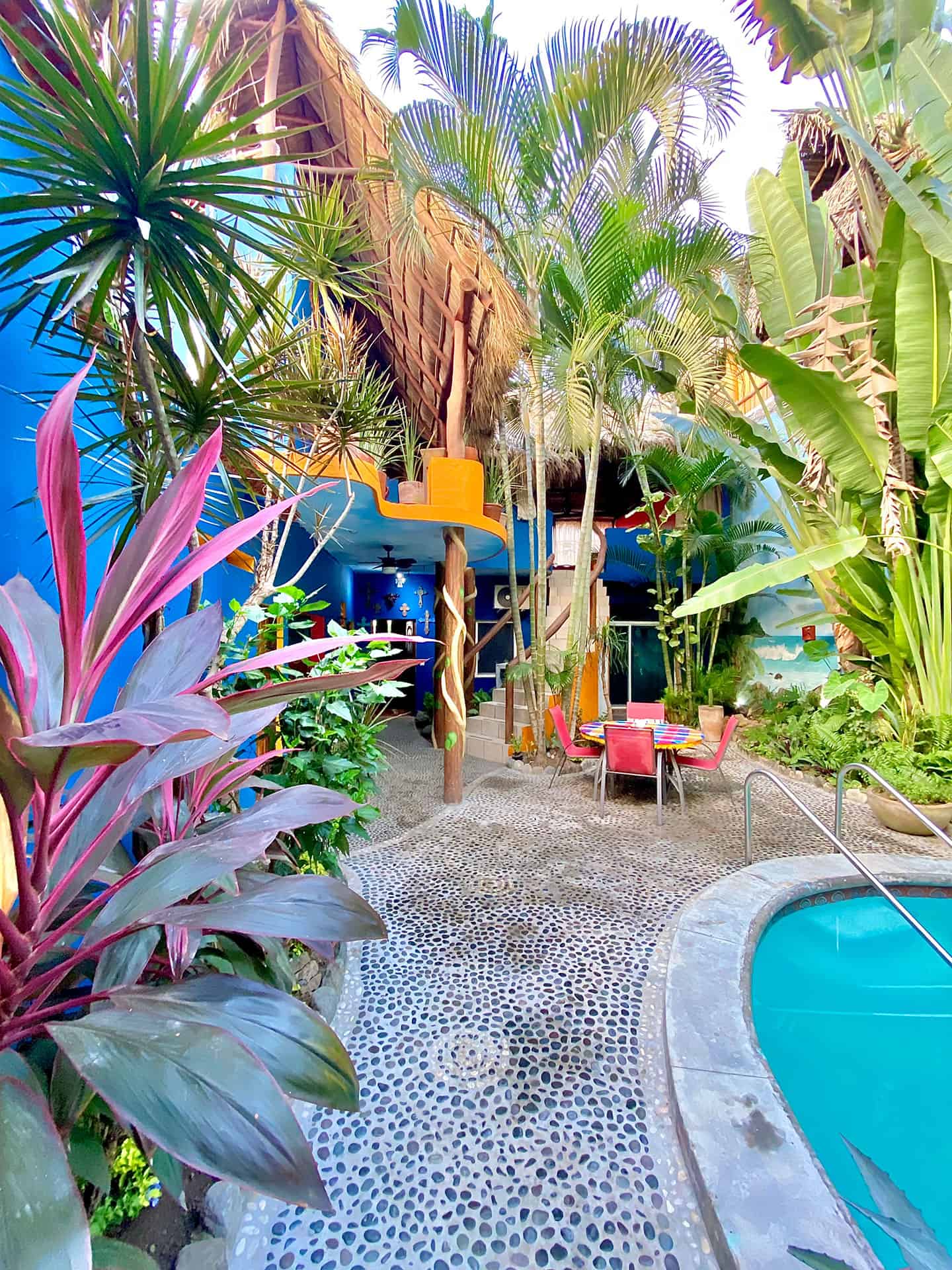 Patio area next to swimming pool.