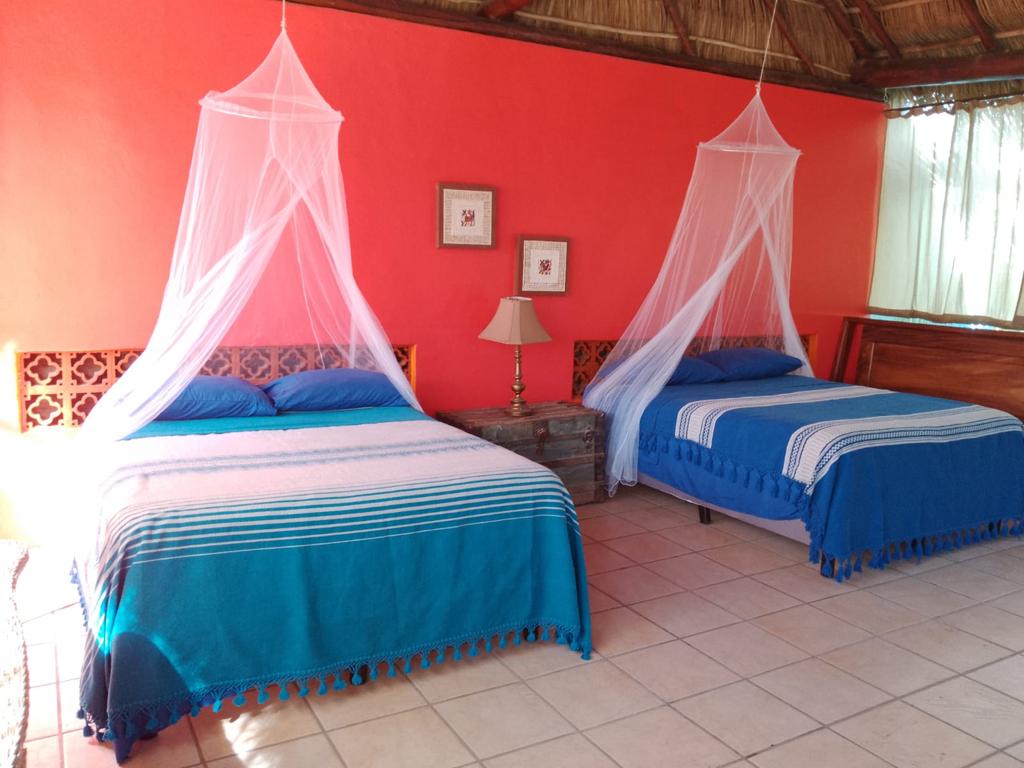 Second floor beds with canopy.