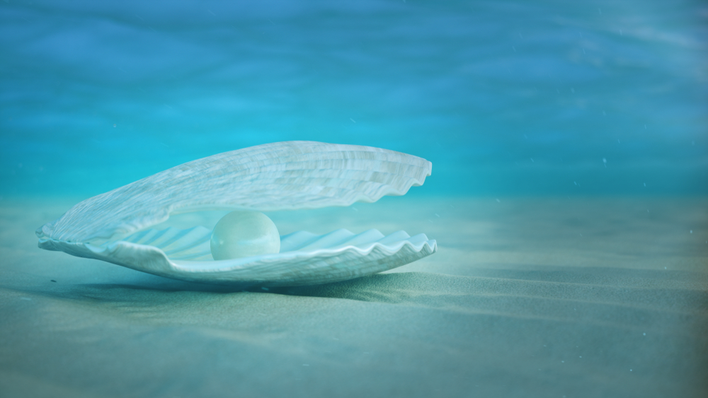 A clam on the seafloor is slightly open revealing a glowing pearl inside.