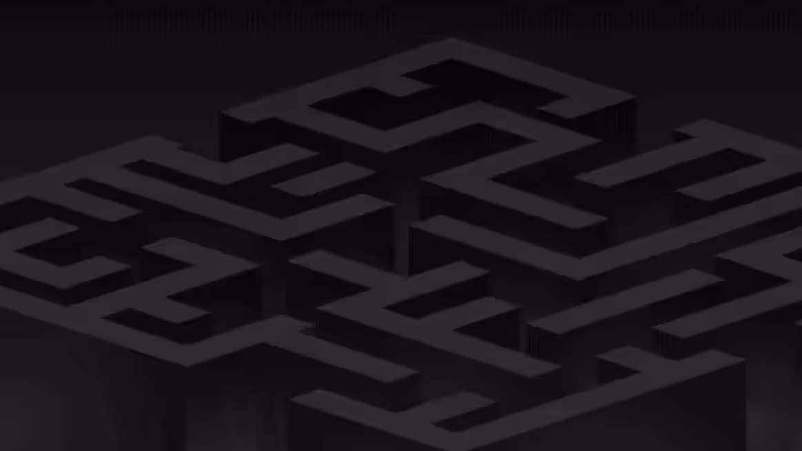 Top-down view of a 3D black maze structure with interconnected pathways on a dark background.