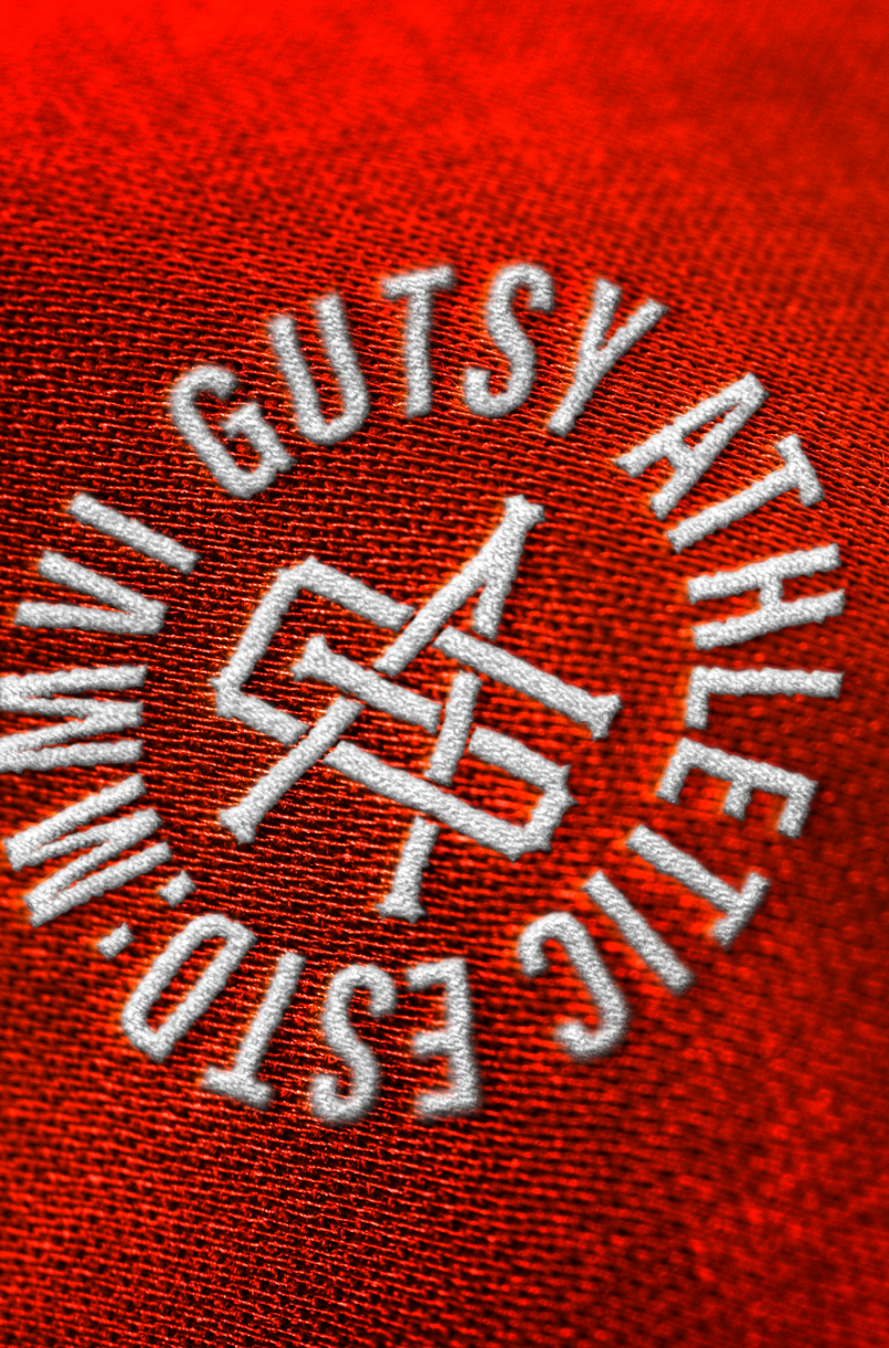 is gutsy athletic logo on shirt