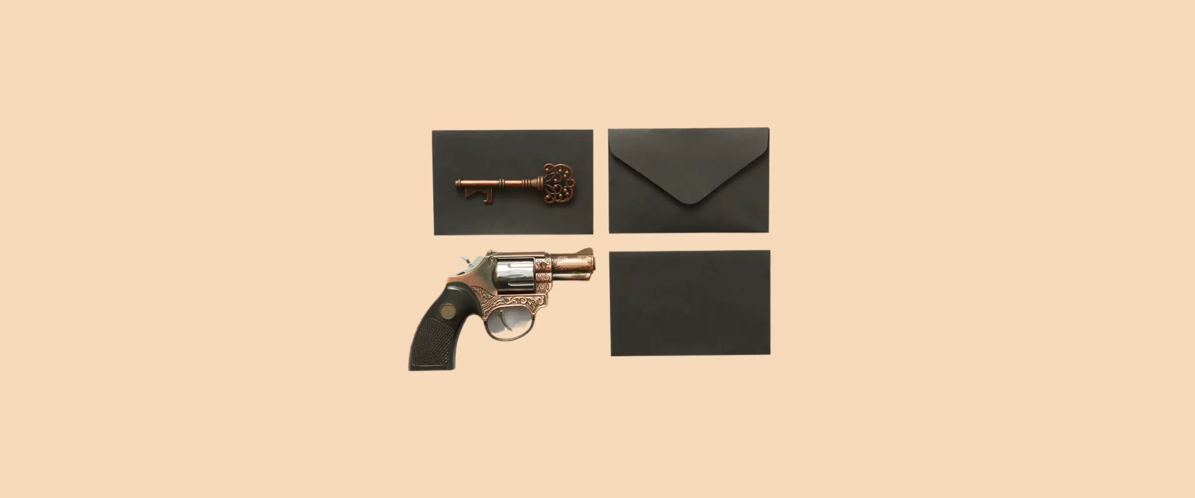 A flatlay of three black envelopes, one bearing a brass key, with a brass revolver taking the fourth place in a square pattern.