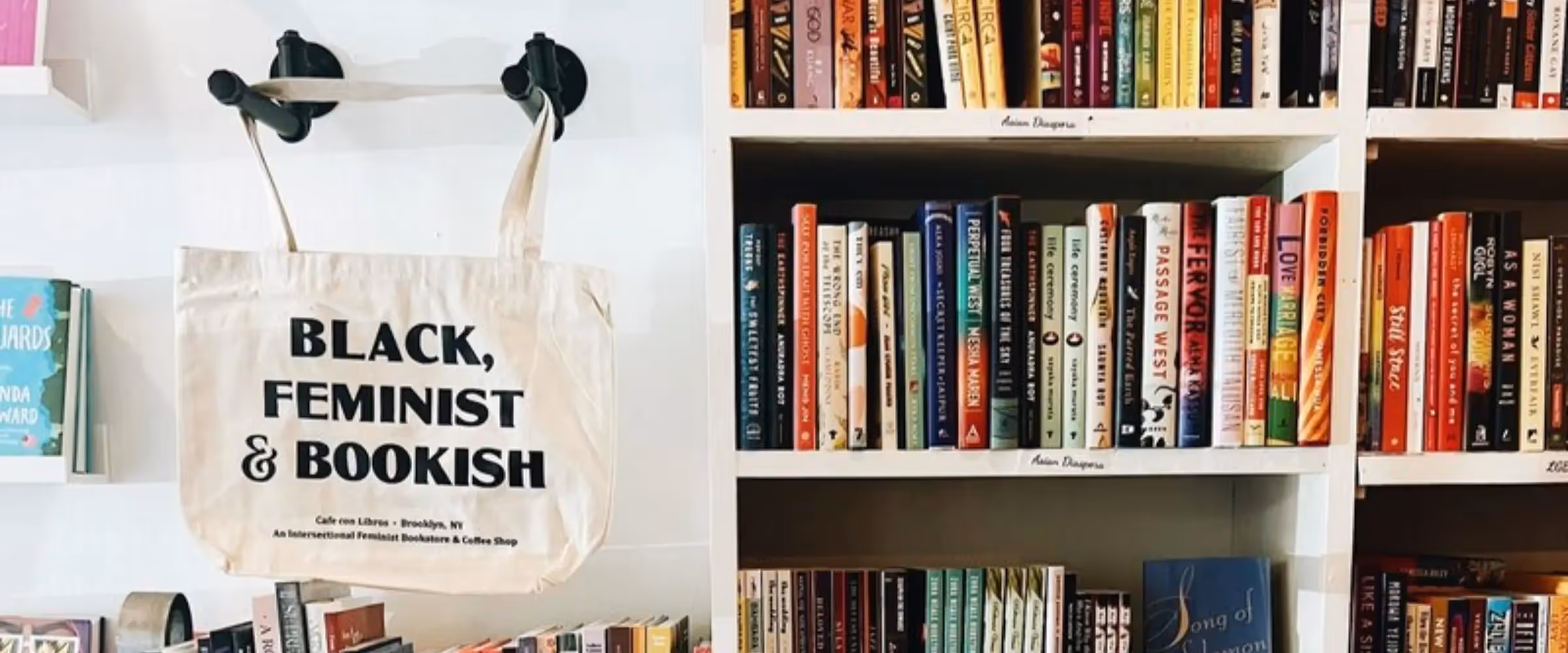 Bookshelves inside the Cafe con Libros bookstore in Brooklyn.